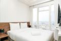 Tranquil 2BR at Menteng Park Apartment By Travelio ホテルの詳細