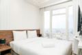 Tranquil 2BR at Menteng Park Apartment By Travelio ホテルの詳細