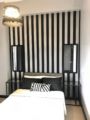 Modern minimalist two bedroom condominium unit ホテルの詳細