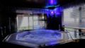 Houtbosch bay honeymoon suite with jacuzzi ホテルの詳細