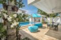 Brand-new Villa Colibri in beachfront villa resort ホテルの詳細
